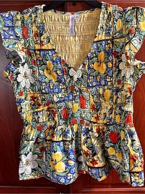 Smocked Floral Peplum Tunic Top in Yellow